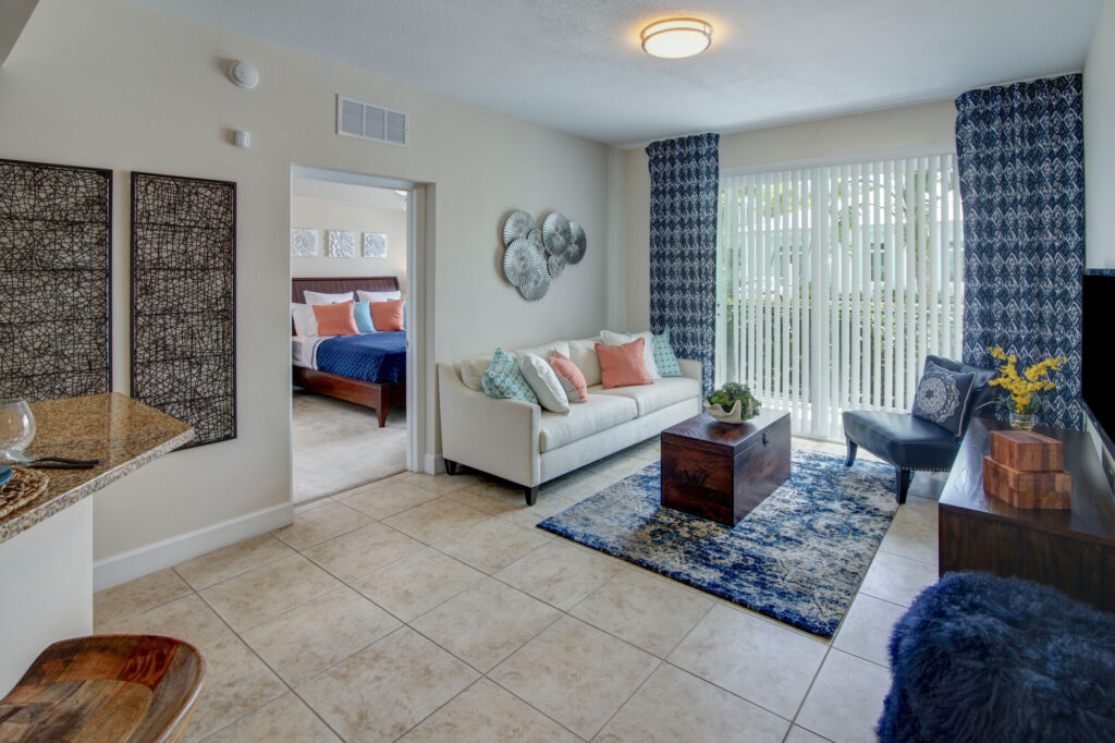 Open concept living room with Glass patio doors