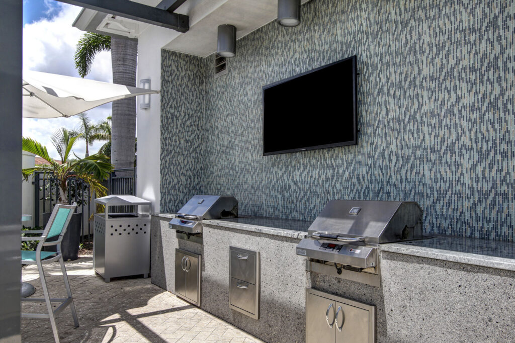 Outdoor grills by the pool